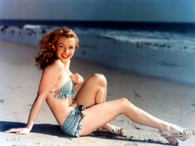 Monroe posing for a photo during her modeling career