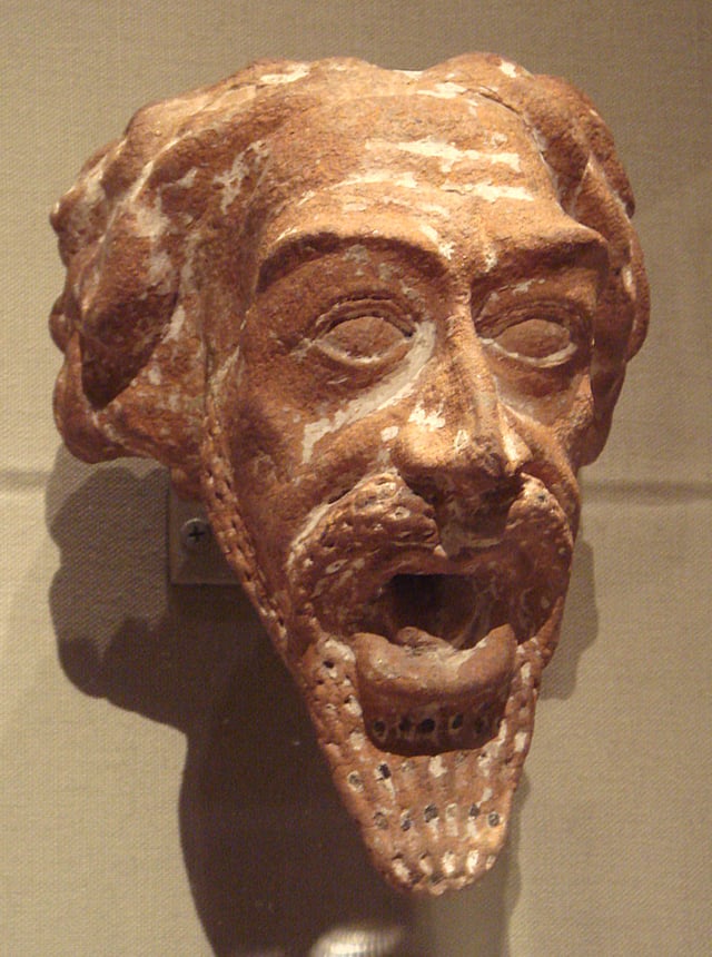 A ceramic Parthian water spout in the shape of a man's head, dated 1st or 2nd century AD