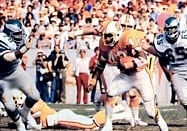 Buccaneers' running back Ricky Bell rushing the ball during the Divisional Playoff Game.