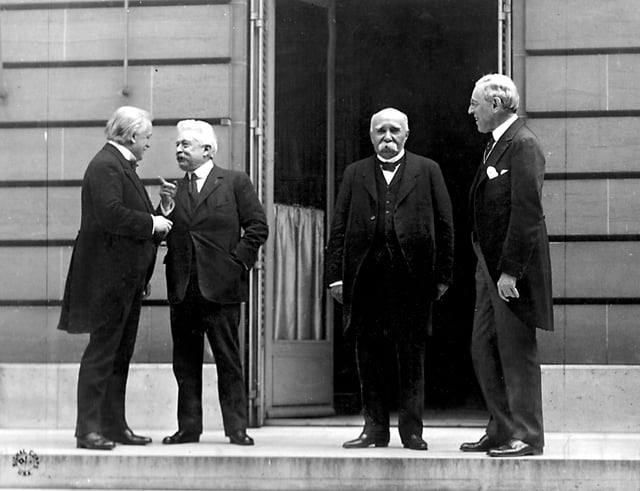 The "Big Four" at the Paris Peace Conference in 1919, following the end of World War I. Wilson is standing next to Georges Clemenceau at right.