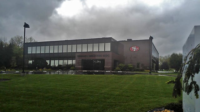 The headquarters of The DeBartolo Corporation in Boardman, Ohio with the 49ers logo on the building, signifying the team's ownership by the Youngstown-based DeBartolo-York family.