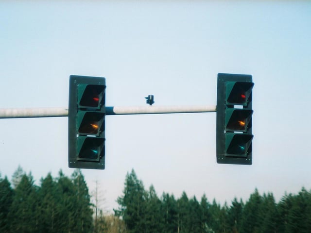 3M traffic signals installed in Shelton, Washington. Standing off-axis from the intended viewing area, these signals are invisible to adjacent lanes of traffic in daylight. (A faint glow is visible at night.)