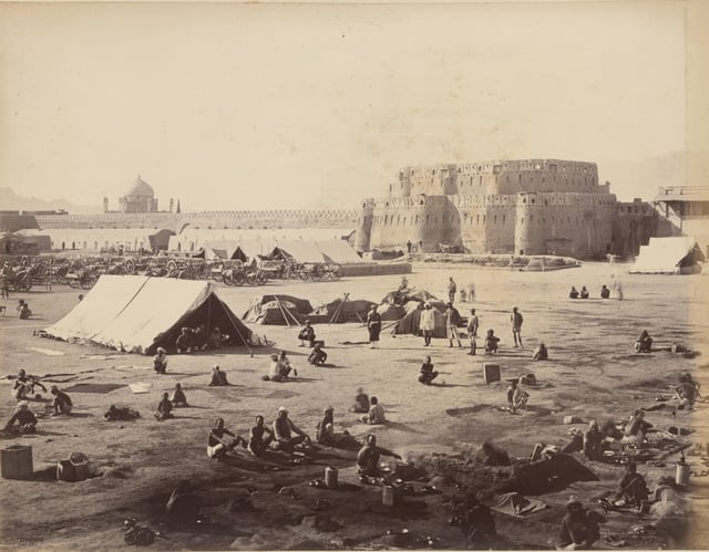 British and allied forces at Kandahar after the 1880 Battle of Kandahar, during the Second Anglo-Afghan War. The large defensive wall around the city was removed in the early 1930s by order of King Nadir.