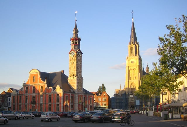 Main Market Square of Sint-Truiden with Town Hall and Church.