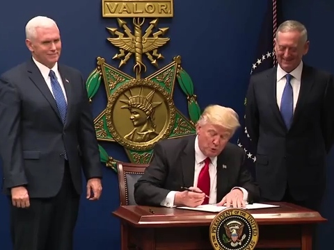 U.S. President Donald Trump signing the original travel ban (Executive Order 13769)