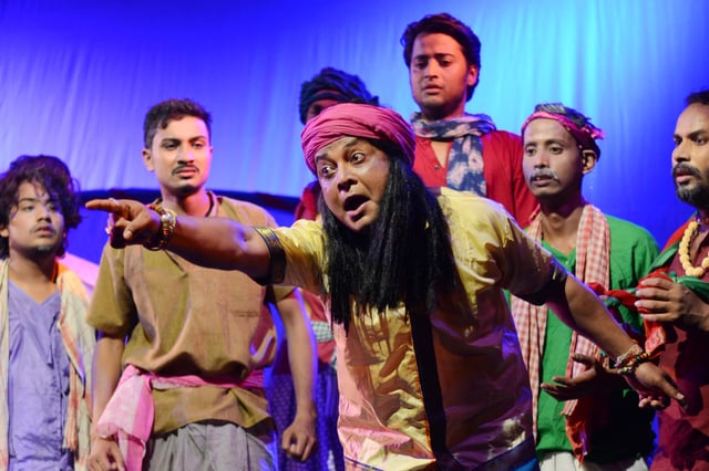 Actors of Abinaswar Gosthi performs the play"Surjya Mandirot Surjyasta" directed by Dipok Borah