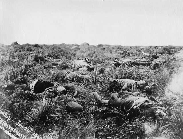 British casualties lie dead on the battlefield after the Battle of Spion Kop, 24 January 1900