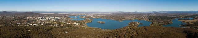 Panorama of Canberra and Lake Burley Griffin set against the backdrop of distant New South Wales, taken from the Telstra Tower