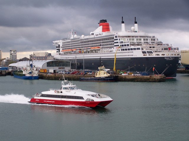 Queen Mary 2 at the new Ocean Terminal, with Isle of Wight passenger ferry Red Jet 3
