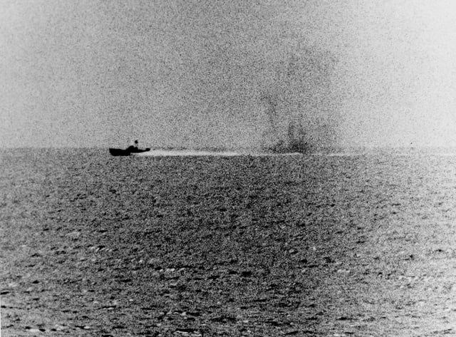 2 August 1964: A North Vietnamese P-4 under fire from Maddox.
