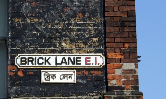 Street sign in English and Bengali on Brick Lane, London