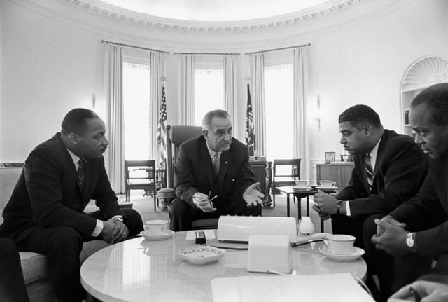 Meeting with civil rights leaders Rev. Martin Luther King Jr. (left), Whitney Young, and James Farmer in the Oval Office in 1964