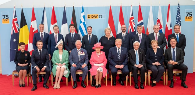 Macron with Theresa May, Angela Merkel, Donald Trump and other world leaders to mark the 75th anniversary of D-Day in June 2019