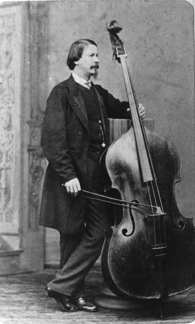 The virtuoso nineteenth-century bassist and composer Giovanni Bottesini with his 1716 Carlo Antonio Testore bass.