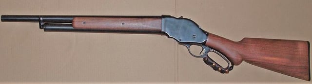 A modern reproduction of the Winchester M1887 lever-action shotgun
