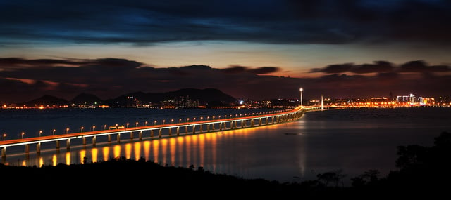 The Shenzhen Bay Bridge forms part of the Shenzhen Bay Port crossing, connecting Dongjiaotou in Shenzhen with Ngau Hom Shek in Hong Kong