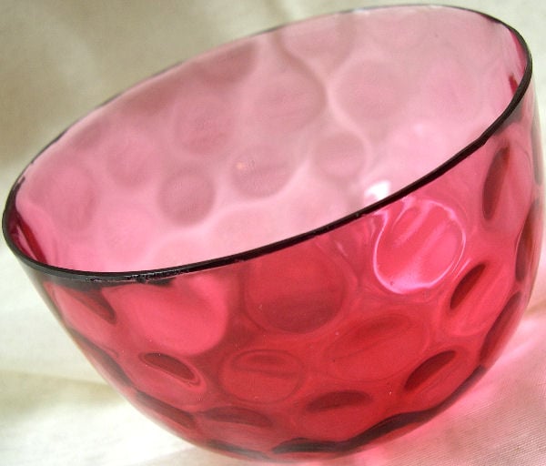 Cranberry glass, while it looks homogeneous, is a mixture consisting of glass and gold colloidal particles of ca. 40 nm diameter, which give it a red color.