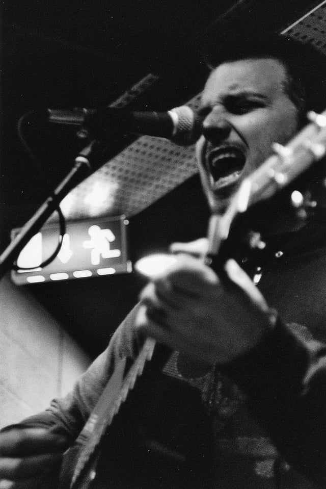 Dustin Kensrue performing at a Fopp instore signing in Southampton, UK.