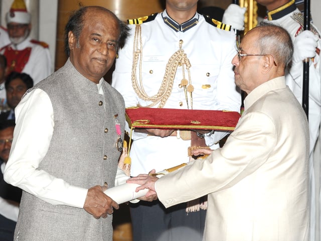 President Pranab Mukherjee presenting the Padma Vibhushan to Rajinikanth at Rashtrapati Bhavan, New Delhi on 12 April 2016