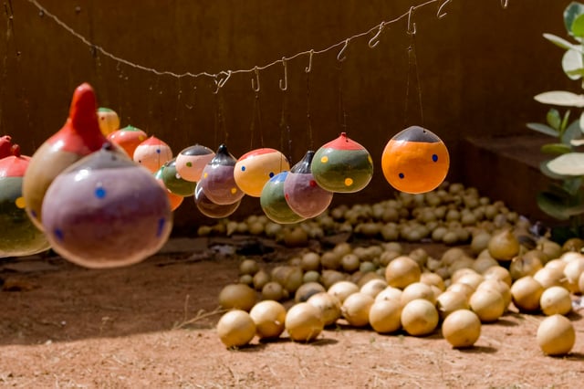 Artisan garland of decorative painted gourds in Ouagadougou.