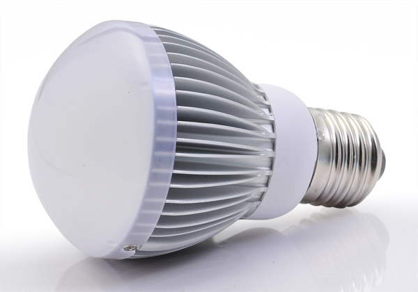 A bulb-shaped modern retrofit LED lamp with aluminium heat sink, a light diffusing dome and E27 screw base, using a built-in power supply working on mains voltage