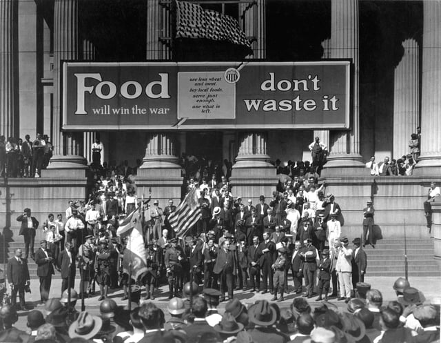 Liberty Loan drive in front of City Hall, New Orleans. On City Hall is a banner reading "Food will win the war—don't waste it".