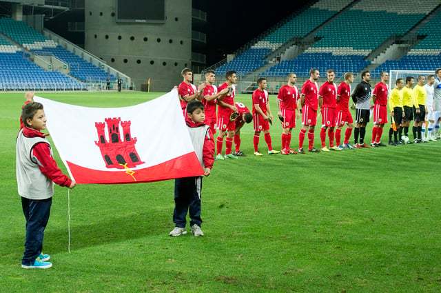 The Gibraltar national football team lining up in their first official match, against Slovakia, in 2013