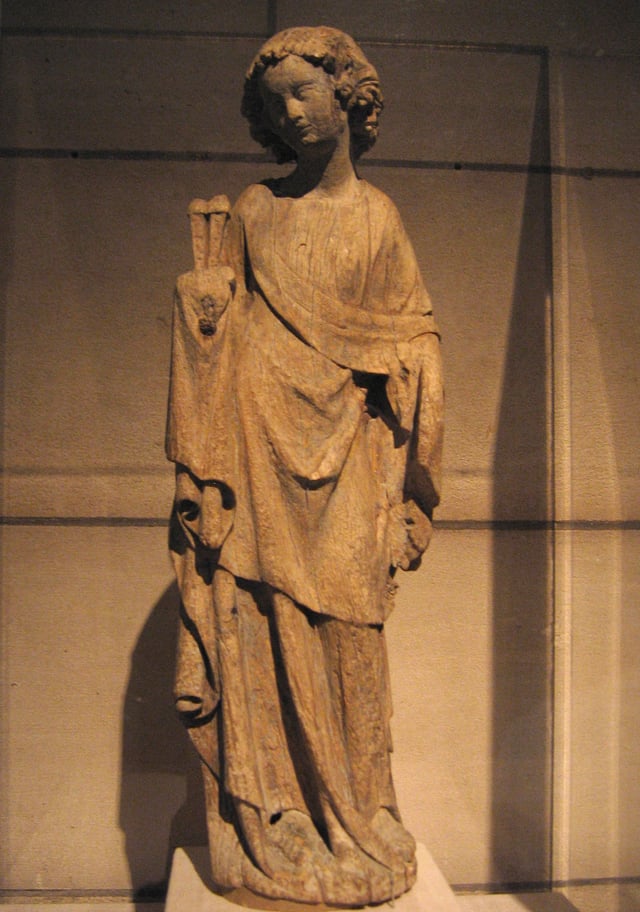 Angel Holding the Holy Nails, formerly one of a series of "Angels of the Passion", oak, formerly painted, Northern French, late 13th century (Metropolitan Museum of Art)