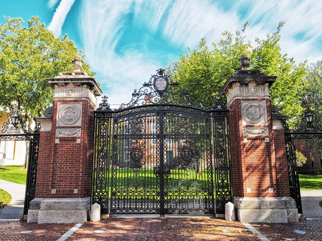 At Convocation, new students march through Van Wickle Gates, built 1900-01, designed by Hoppin and Ely of Providence and Hoppin and Koen of New York. The gates were the gift of Augustus Stout Van Wickle, class of 1876, who also gave the FitzRandolph Gateway at Princeton, built 1905, as a memorial to his ancestor Nathaniel FitzRandolph