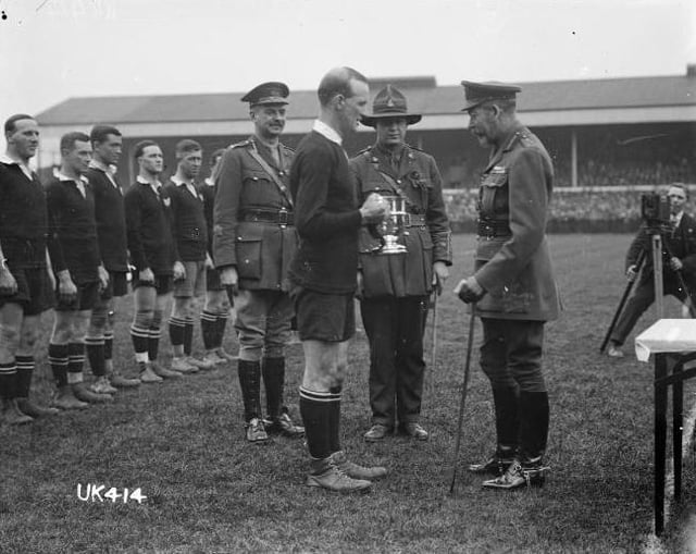 James Ryan, captain of the New Zealand Army team, receiving the Kings Cup from George V.