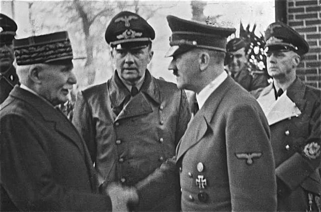 Philippe Pétain (left) meeting with Hitler in October 1940.