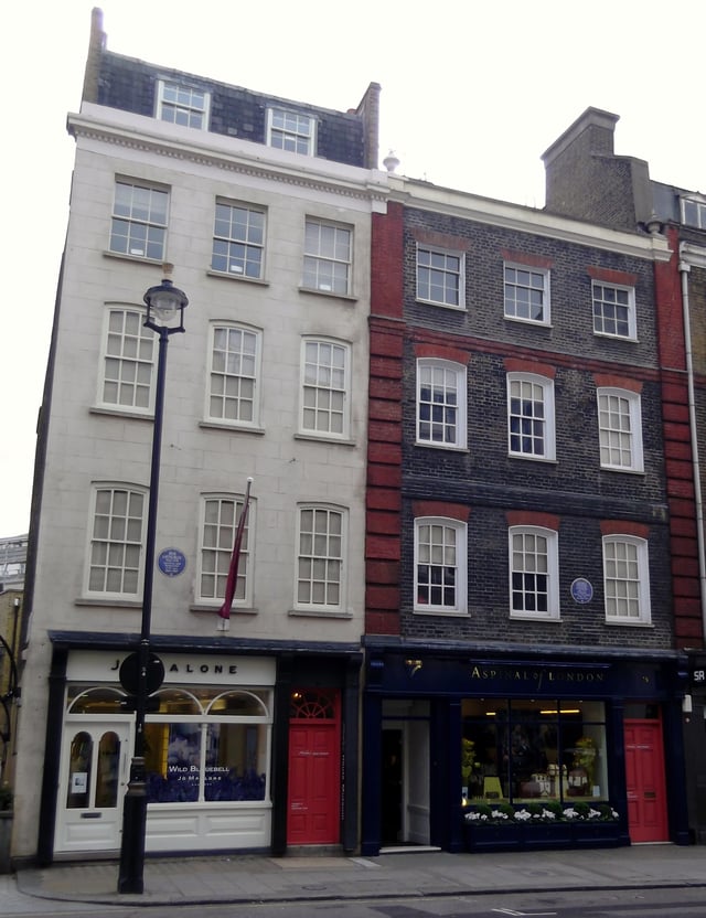 The white building (left) is 23 Brook Street; the building on the right is the Handel House Museum.
