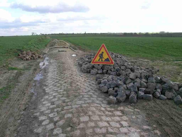 Pavé under repair by Les Amis de Paris–Roubaix
