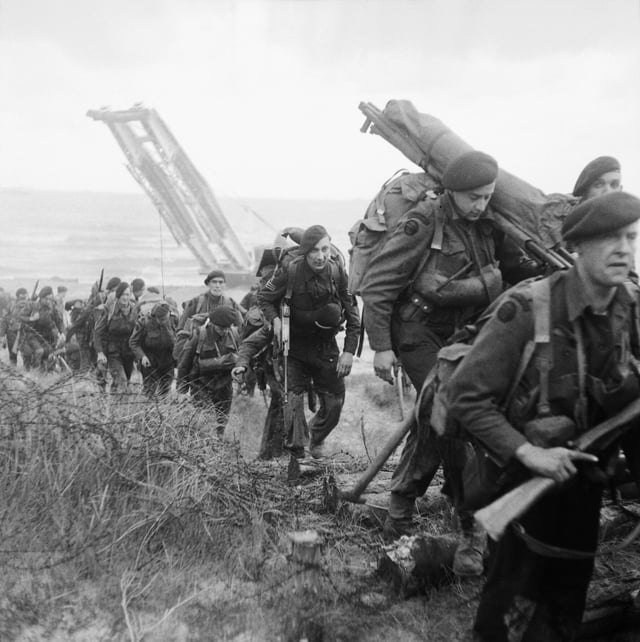 Royal Marine Commandos attached to 3rd Infantry Division move inland from Sword Beach, 6 June 1944