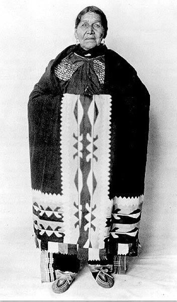 Susie Elkhair (d. 1926) of the Delaware Tribe of Indians, wearing ribbonwork shawl.
