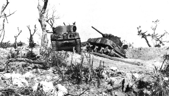 Two US M4 Sherman tanks knocked out by Japanese artillery at Bloody Ridge, April 20, 1945