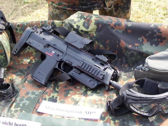 A recent production MP7A1 (note the safety trigger) with a Zeiss RSA reflex red dot sight on display as part of Germany's IdZ program.