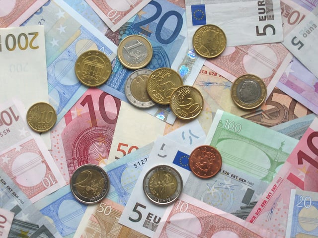 Euro coins and banknotes of various denominations