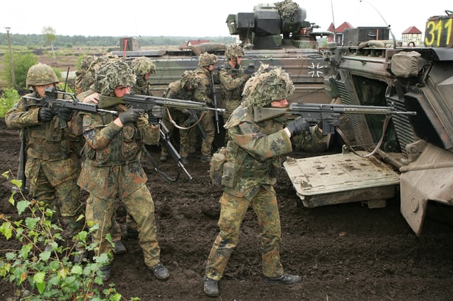 Bundeswehr soldiers armed with G3A3A1 and G36 rifles in 2010