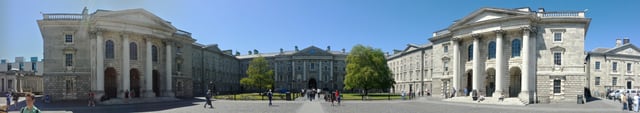 A panorama taken from Parliament Square. The row of buildings is framed by the Public Theatre on the left and the Chapel on the right. In the middle lies Regent House with its archway leading to the Front Gate.