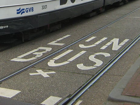 Dutch uses the digraph IJ as a single letter. Shown is a bus road marking saying lijnbus.