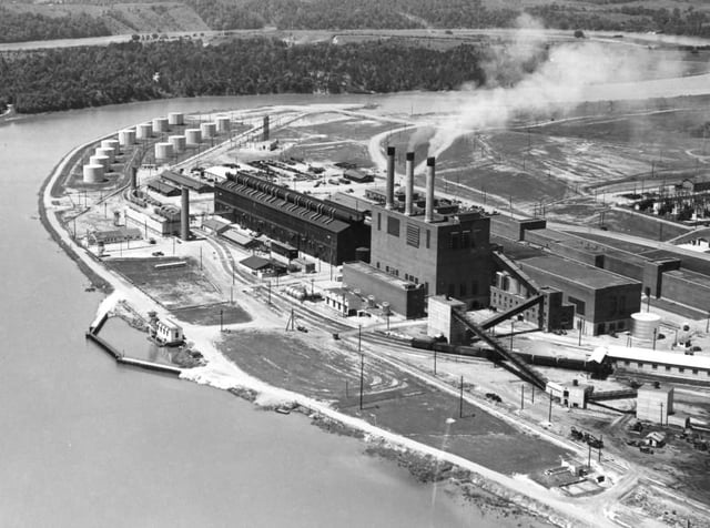 The S-50 plant is the dark building to the upper left behind the Oak Ridge powerhouse (with smoke stacks).