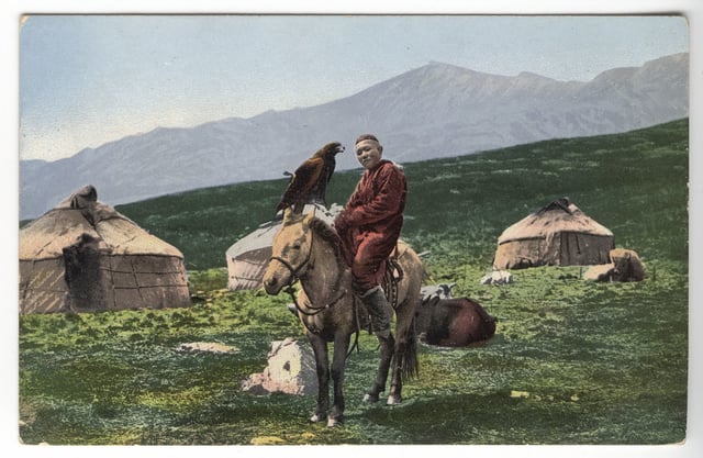 Kazakh man on a horse with golden eagle