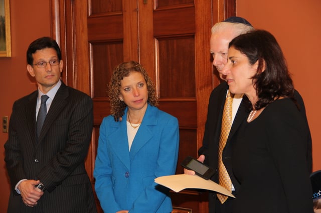 Former House Majority Leader Eric Cantor, left, Rep. Debbie Wasserman Schultz, second from left, listen as Sheryl and Tuly Wultz talk about the impact of prayer in the life of their son, Daniel Wultz on May 1, 2014, in the Office of the House Majority Leader, Washington, D.C.