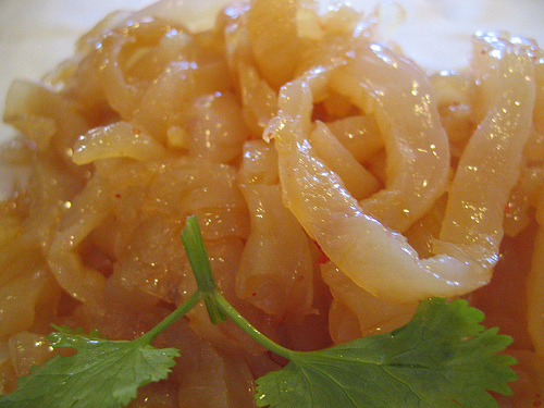 Rehydrated jellyfish strips prepared with soy sauce and sesame oil