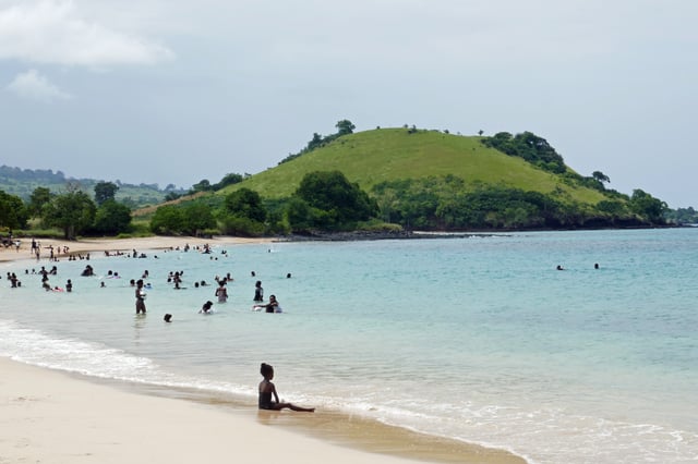 Santomeans on the beach, Lobata District