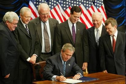 Santorum at the signing of the Partial-Birth Abortion Ban Act by Pres. George W. Bush in 2004
