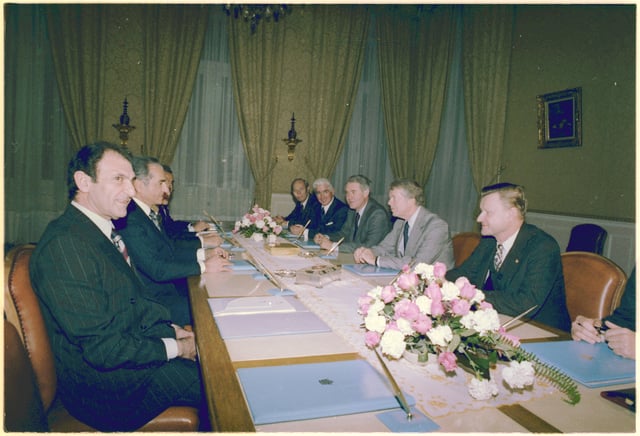The Shah of Iran (left) meeting with members of the U.S. government: Alfred Atherton, William Sullivan, Cyrus Vance, Jimmy Carter, and Zbigniew Brzezinski, 1977