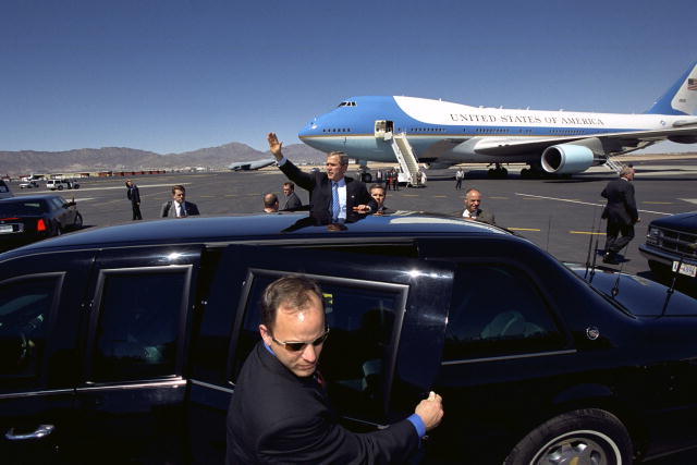 Secret Service agents protecting President George W. Bush in 2002