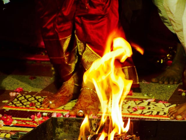 A wedding is the most extensive personal ritual an adult Hindu undertakes in his or her life. A typical Hindu wedding is solemnized before Vedic fire ritual (shown).